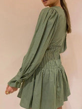 Load image into Gallery viewer, SALE CHER V NECK STITCH WAIST MINI DRESS IN OLIVE By NICOLA - Preloved Designer Consignment
